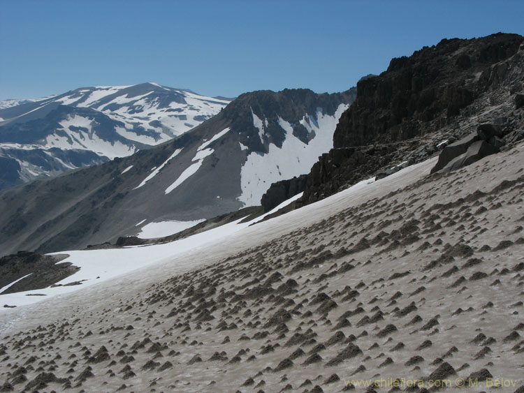 A view of snow-covered slopes near the Las Animas Pass, Mondaca Trail, Radal Siete Tazas, Chile.