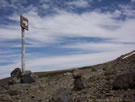 A sign pointing towards Laguna El Alto, Lircay, Vilches, Chile.