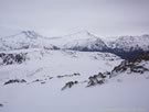 View of Descabezado Grande y Cerro Azul in winter from Cerro El Peine, Lircay, Vilches, Chile.