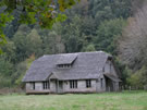 Image of an old wooden house.