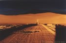 An image of a road which goes from Panamericana Highway to Salar de Pajonales at sunset, similar to moonscape,  Chile.